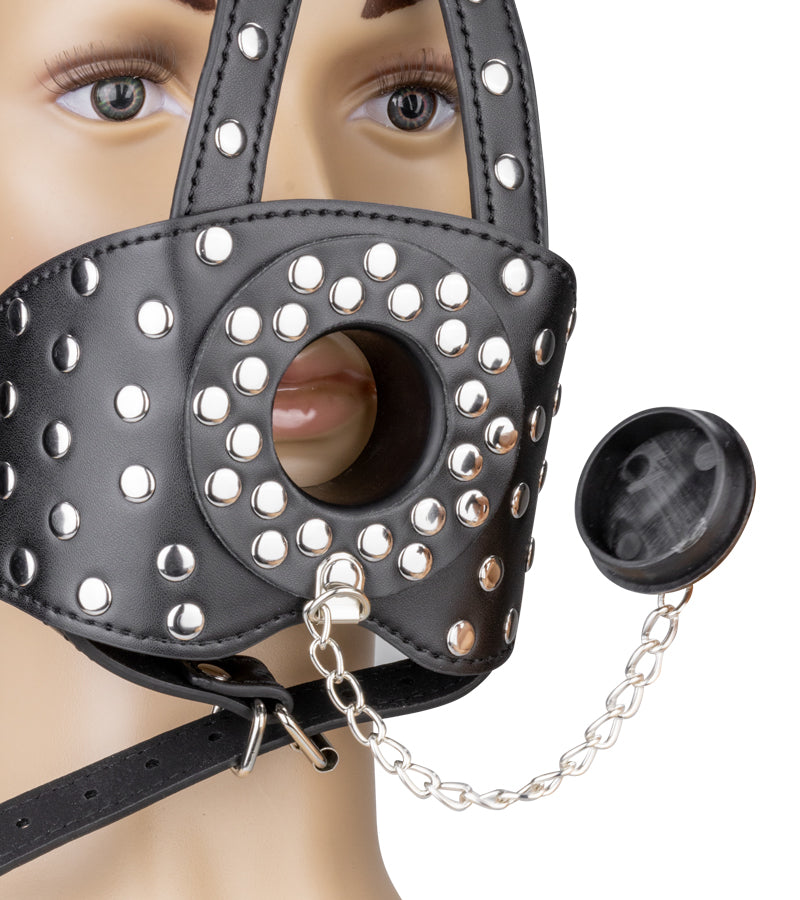 Gag mask with plug opening